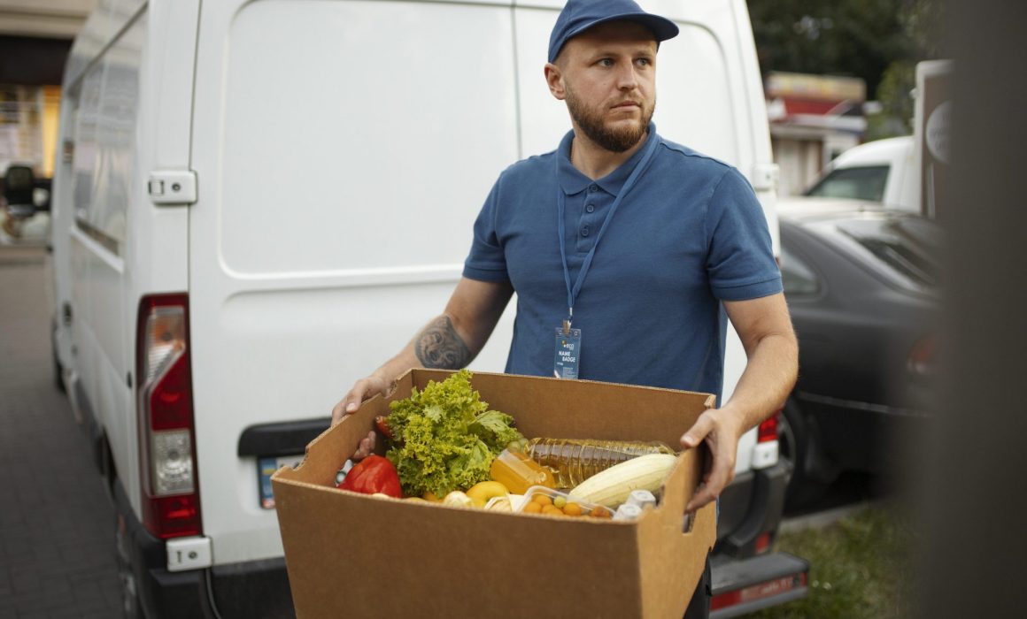 Courier delivering fresh vegetables