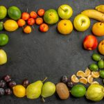 a wide range of fruit laid out in the shape of a rectangle