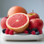 grapefruit, apples, berries, watermelon on a weight scale